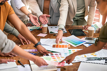 Image showing Color choice, creative and hands of business people on desk for branding meeting, strategy and marketing design. Teamwork, collaboration and designers brainstorming ideas, thinking and logo project