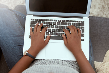 Image showing Laptop, woman and hands typing on a keyboard while working on a freelance project at her house. Technology, research and closeup of female working on a report with a computer in living room at home.