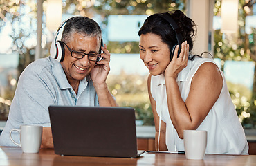 Image showing Laptop, headphones and senior couple on video call in home, chatting and talking. Technology, computer and happy, elderly and retired man and woman in virtual conversation or online streaming