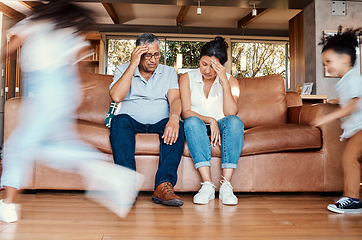 Image showing Kids running, stress and grandparents on sofa tired and chaos in living room with frustrated grandpa and grandma. Parenting burnout, hyperactive children playing in home with old woman and man