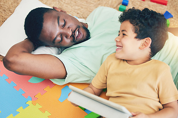 Image showing Relax, father and boy on floor with tablet for playing, creative activity and fun learning with digital tech. Education, child development and dad and kid enjoy online game, internet and bond at home