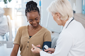 Image showing Blood pressure, hypertension and doctor with black woman in hospital of healthcare, consulting and clinic services. Medical worker check patient arm pulse, test and heart wellness of diabetes results