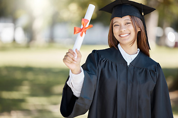 Image showing Graduation, university diploma and portrait of woman on campus with smile for success, award and achievement. Education, college and happy graduate student with certificate, degree and academy scroll