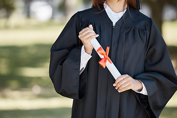 Image showing Graduation, education and hands of woman with diploma for ceremony, award and achievement on campus. University success, college and graduate student holding certificate, degree and academy scroll