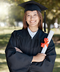 Image showing Education, graduation and portrait of woman with diploma on campus for success, award and achievement. University, college and happy female graduate smile with certificate, degree and academy scroll