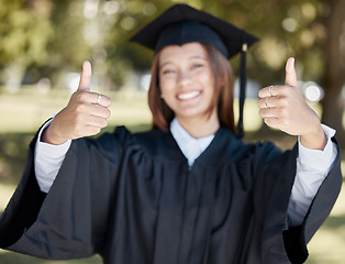 Image showing University, graduation and student with thumbs up for success, award and certificate ceremony. Education, college and happy girl graduate with hand sign for goals, victory and achievement on campus