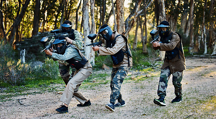 Image showing Army, military and people with guns for paintball, shooting game and training in nature. Fitness, teamwork and group of friends playing sporty games, running for battle and target game in a forest