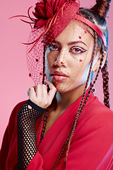 Image showing Punk, metal and portrait of a young woman with creative designer, fashion and edgy clothing. Isolated, pink background and gen z latino model youth with cool, rocker and funky style in a studio