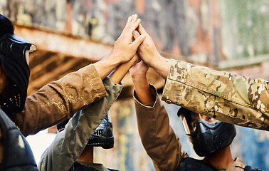 Image showing Motivation, paintball team or hands high five on a mission, friends or soldier training on war battlefield. Goals, target success or people with support in partnership or military group solidarity