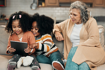 Image showing Watching, movie and children with grandmother and a tablet for games, education or website. Interracial, digital and girls playing on technology, streaming a show and film with a senior woman