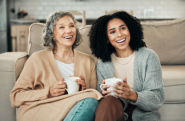 Image showing Love, mother and adult daughter on floor, coffee and quality time in living room, happiness and relax. Family, female child or mama with tea, smile or loving together in lounge, rest and conversation
