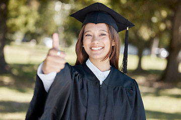 Image showing University, graduation and portrait of girl with thumbs up on campus for success, award and certificate ceremony. Education, college and happy female graduate with hand sign for goals and achievement