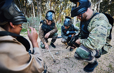 Image showing Paintball, team and military strategy with mission, teamwork and war zone with sports outdoor. Soldier group, people planning tactical game plan on battlefield with adventure and communication