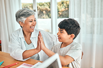 Image showing Happy learning, high five and child education development at home with grandparent teacher. Teaching, elderly woman help and homework achievement hand gesture of a senior person and kid at a house