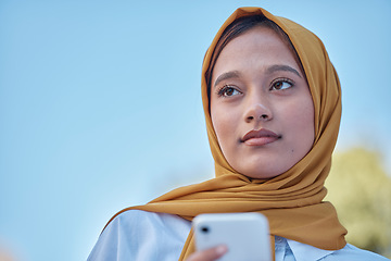 Image showing Muslim, young woman in hijab and outdoor with phone, travel with social media and face with peace and calm. Islamic fashion, youth and gen z with thinking, smartphone and female in Dubai with mockup