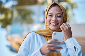 Image showing Phone, outdoor and portrait of muslim woman with mindset for international culture, city networking and mobile app. Young hijab entrepreneur or face of islamic person from Saudi Arabia on cellphone