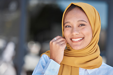 Image showing Travel, smile and portrait of Muslim woman in city for happy, relax and natural in Dubai. Islamic, positive and confident with face of girl wearing hijab in urban town with mockup and happiness