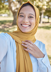 Image showing Muslim, young woman and selfie with hijab outdoor, happy influencer with travel blog, freedom in nature and vacation. Islamic fashion, gen z youth and female smile in picture in Dubai with memory