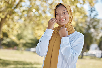 Image showing Hijab, smile and portrait of Muslim woman in park for travel, relax and natural in Indonesia. Islamic, positive and confident with proud girl in field of nature for calm, weekend and happiness