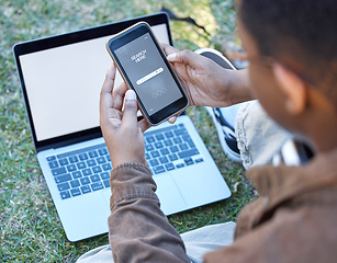 Image showing Man, hands and phone with laptop in search for marketing, online advertising or browsing outdoors. Hand of male student on mobile smartphone app or computer display for remote research in nature