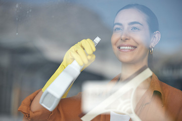 Image showing Window cleaning, woman smile and happy maid at home washing windows with glass cleaner. Helping, working and girl with spray for squeegee and house chores and disinfectant doing housekeeping