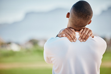 Image showing Fitness, back pain and man with injury after exercise, training or workout outdoors. Sports, health and young male athlete with fibromyalgia, inflammation or arthritis, tendinitis or painful spine.