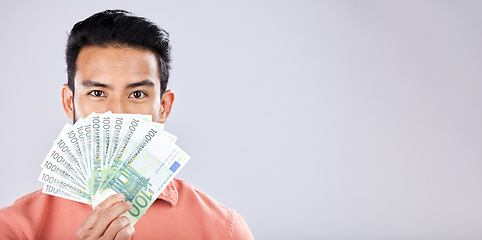 Image showing Man, portrait or money fan on isolated studio background in financial freedom, stock market profit or investment. Winner, cash or euro for asian person for finance success, savings or growth mockup