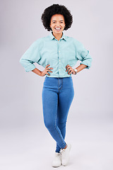 Image showing Fashion, relax and portrait of black woman with stylish clothes standing isolated in a studio white background. Happy, excited and confident female person crossed legs in trendy outfit or clothing