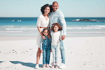 Image showing Portrait, family and children on beach, vacation and summer break with happiness, cheerful and loving. Face, parents and children on seaside holiday, getaway and smile for bonding, trip and joyful