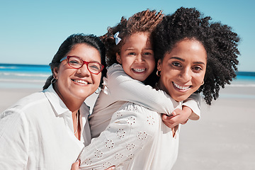 Image showing Portrait, mother and grandmother with girl at beach, smiling and bonding together at seashore. Care, family and happy grandma and mama carrying kid, having fun and enjoying summer time vacation.