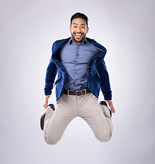 Image showing Jump, excited and portrait of man in studio with surprise, happiness and celebration on white background. Winner, success mockup and isolated happy male jumping with energy for winning, smile and joy