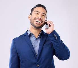 Image showing Excited, business and Asian man with success, phone call and connection against a grey studio background. Japanese male employee, ceo and entrepreneur with smartphone, talking and networking signal