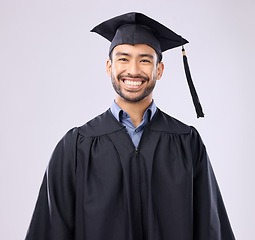 Image showing Graduation portrait of asian man isolated on studio background for education, college success or achievement. Happy face of young philippines student, scholarship person or university graduate smile