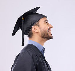 Image showing University, graduation and man with success, knowledge and guy against a grey studio background. Male graduate, academic and student with robe, cap and education with development, learning and smile