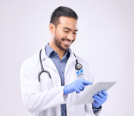 Image showing Mockup, man and doctor with tablet, healthcare and success against a grey studio background. Male employee, medical professional and consultant with device, research and website for online reading