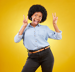 Image showing Funny, happy and black woman with peace sign, smile and girl against a studio background. African American female, lady and gesture for chill, goofy and silly with joy, cheerful and positive mindset