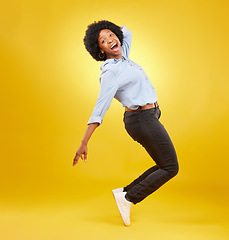 Image showing Wow, excited and black woman in dance pose on yellow background with energy, happiness and smile in studio. Winner mockup, celebration and isolated happy girl dancing for freedom, winning and success