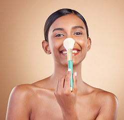 Image showing Portrait, nose and blush with a model woman in studio on a beige background to promote makeup. Face, blusher and product with an attractive young female posing for cosmetics or luxury wellness