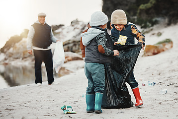 Image showing Environment, plastic bags and children on beach, recycle and cleaning on earth day, reduce waste and helping. Friends, volunteers and kids with climate change project, sustainability or pick up trash