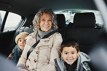 Image showing Portrait, car ride and grandmother relax with children or grandchildren while travel or on a road trip in the backseat. Bonding, happy and grandma traveling with kids or grandkids on a journey