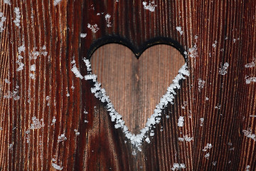 Image showing Wood Background with snowflakes