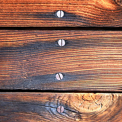 Image showing Wooden Background with Screws