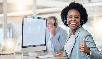 Image showing Laughing, portrait and black woman in a call center with a thumbs up for online support and thank you. Smile, success and African customer service worker with an emoji hand gesture for achievement