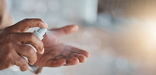 Image showing Hands, spray sanitizer and bacteria safety with mockup space, blurred background and healthcare. Palm, bottle and disinfection from virus, cleaning and self care to stop covid with medical mock up