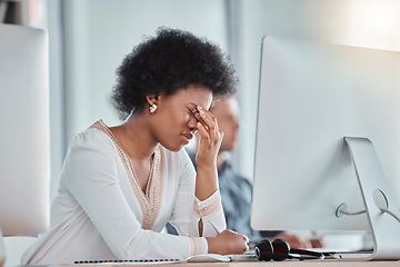 Image showing Tired, headache and woman on computer in office workspace with job depression, burnout and mental health risk. Business person working on desktop with workplace noise and stress, fatigue or migraine