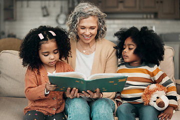 Image showing Family kids, book and grandma reading fantasy storybook, story or bonding on home living room sofa. Grandmother love, novel and elderly woman with child development for biracial kindergarten children