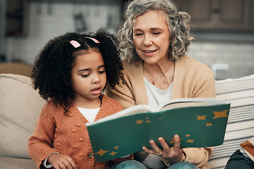 Image showing Adoption child, book and grandmother reading fantasy storybook, story or bonding on home living room sofa. Family love, grandma and senior woman with youth development for learning kindergarten girl