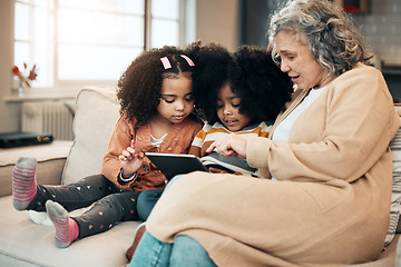 Image showing Watching, entertainment and children with grandmother and a tablet for games, education or website. Interracial, digital and siblings playing on tech, streaming a show and film with a senior woman