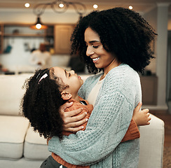 Image showing Family, love and child hug mom for Mothers Day, home bonding or embrace in house living room. Care, loving and happy mother or woman smile with female youth kid, girl or daughter in apartment