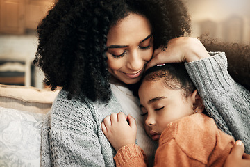 Image showing Family, love or child hug mother for Mothers Day, home bonding or embrace on living room couch. Care, custody and biracial mom, mama or woman with female youth kid, girl or daughter cuddle on sofa